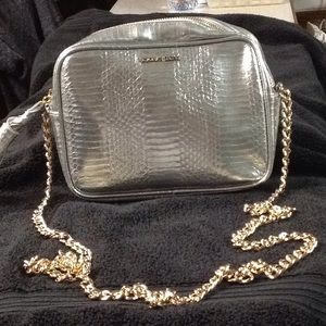 Silver VICTOTIA SECRET cross body purse